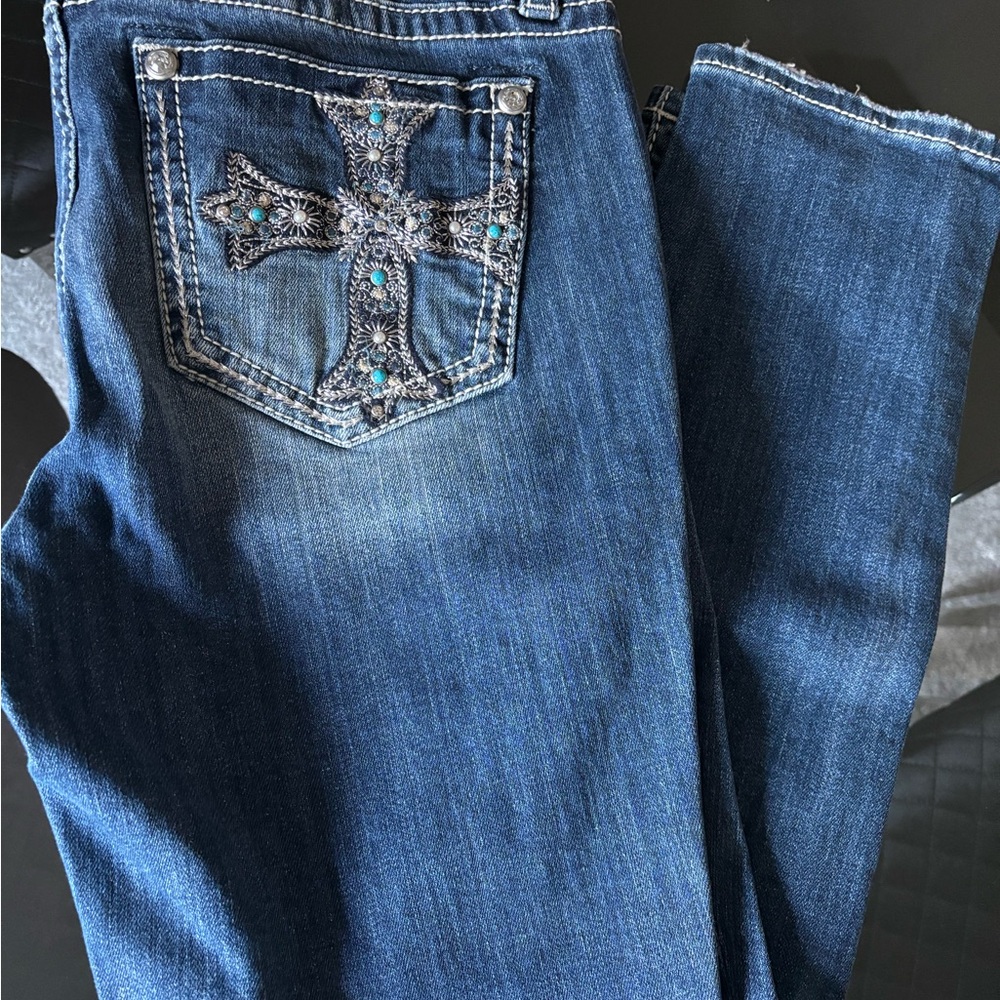Miss Me jeans with cross patchwork on pockets